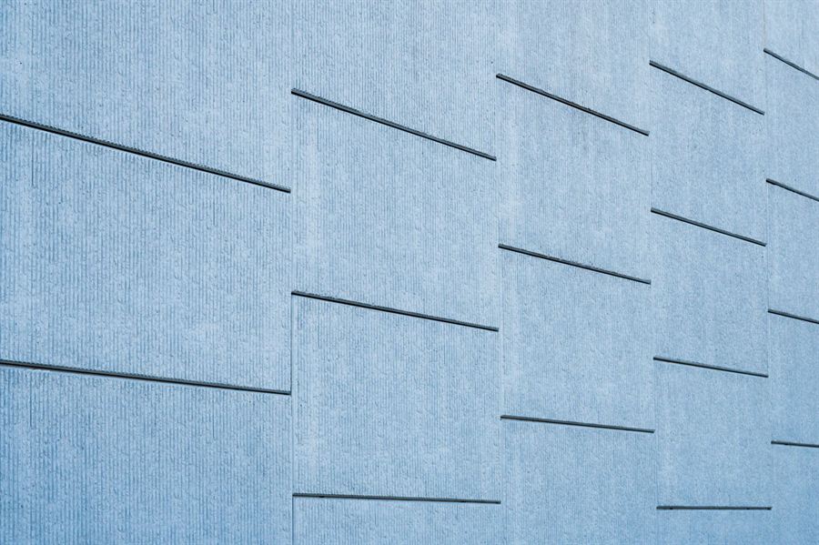 Fibre cement cladding panels with expressed joints